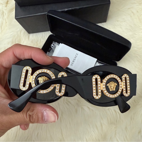 Versace Black Sunglasses with Gold Detail
VE4426BU brand new - Picture 8 of 8